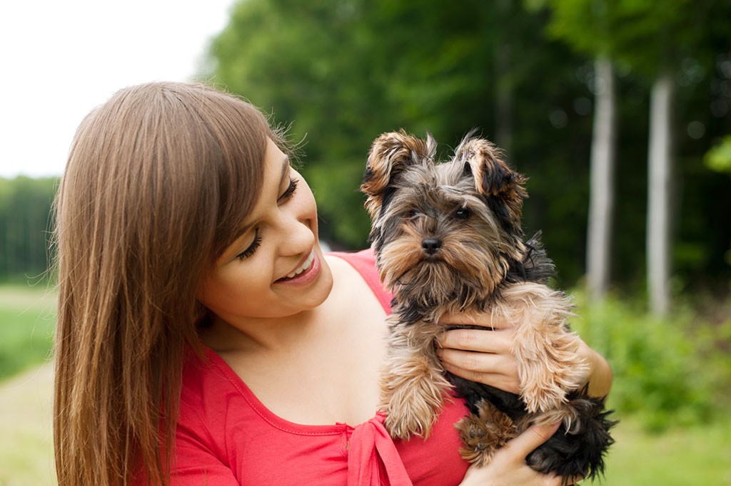 Smiling Woman with Small Dog